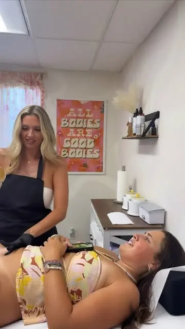 A relaxed client mid sugaring session in the treatment room