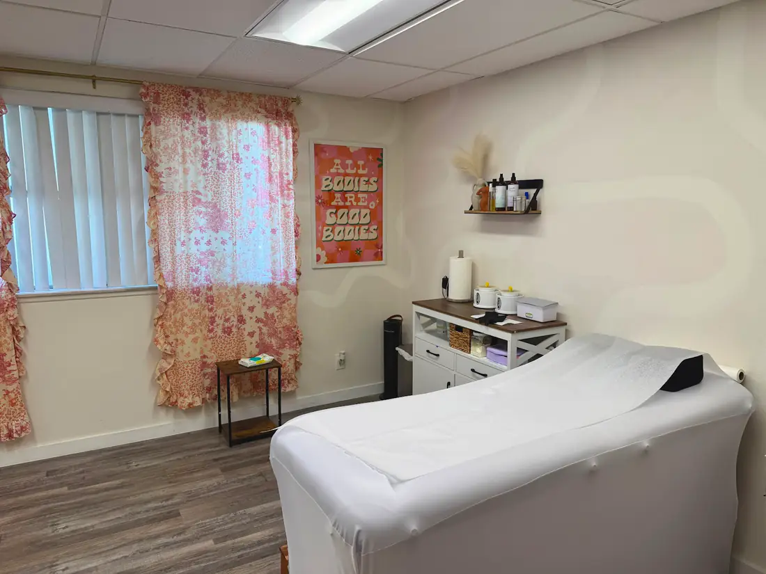 Bright treatment room with floral curtains